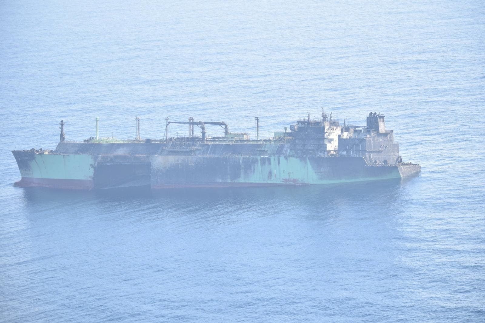 Arctic Metagas later, still afloat: burned superstructure and stained moss-green hull. Not a picture of 3 March, and not a wreck.