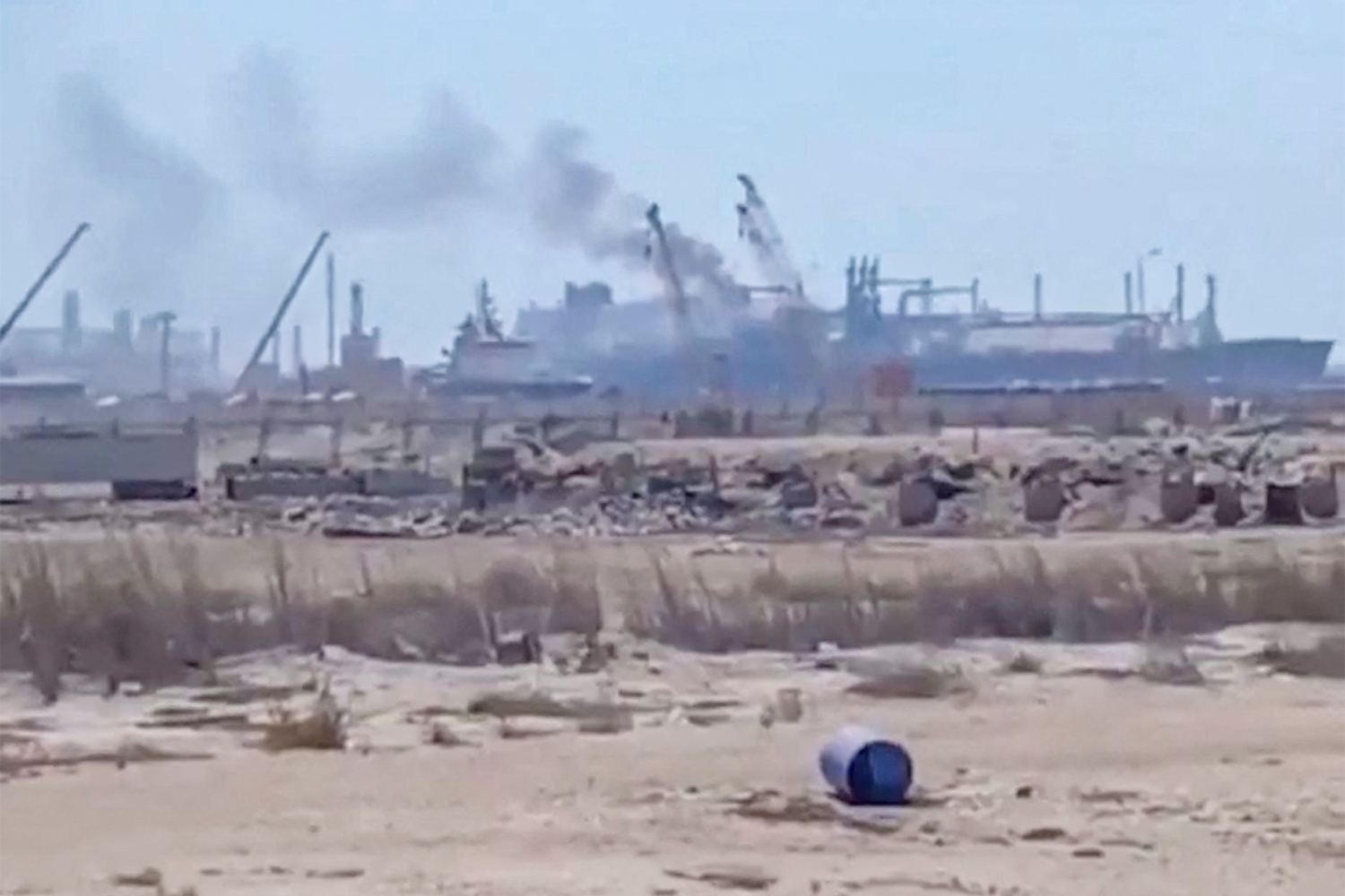 Water jets and smoke at the Damietta berth on 29 July. Frame does not identify which hull, or who launched the drone.